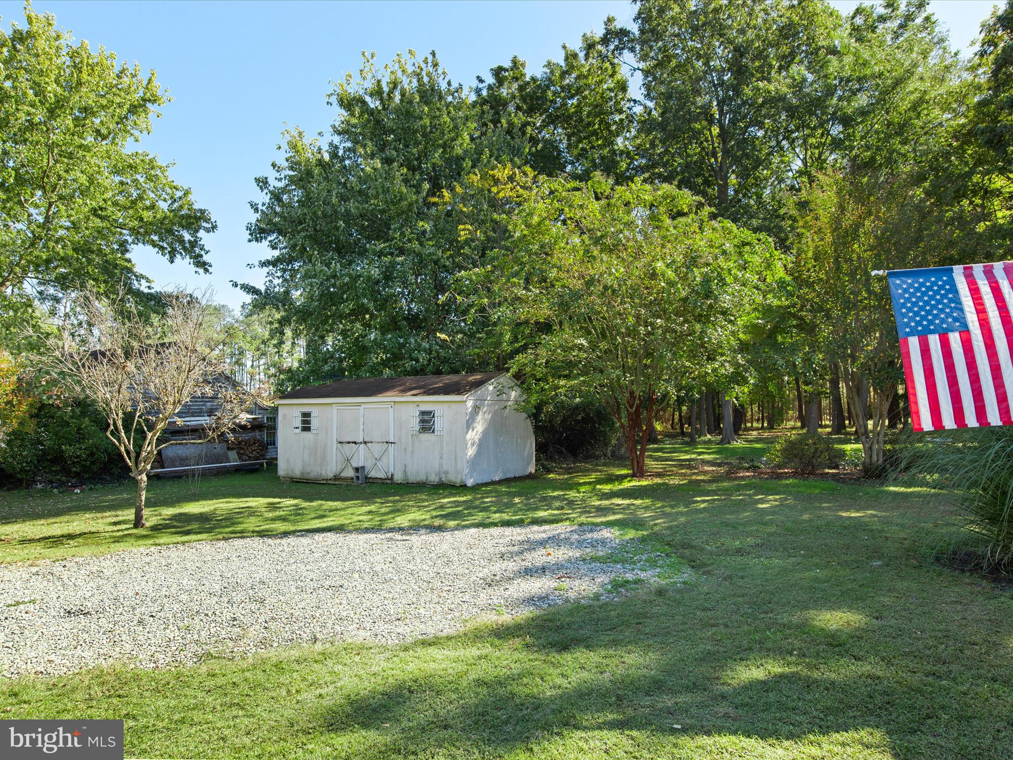 26905 Mt Vernon Road Princess Anne, MD 21853 - Photo 60 of 74 a backyard of a house with lots of green space