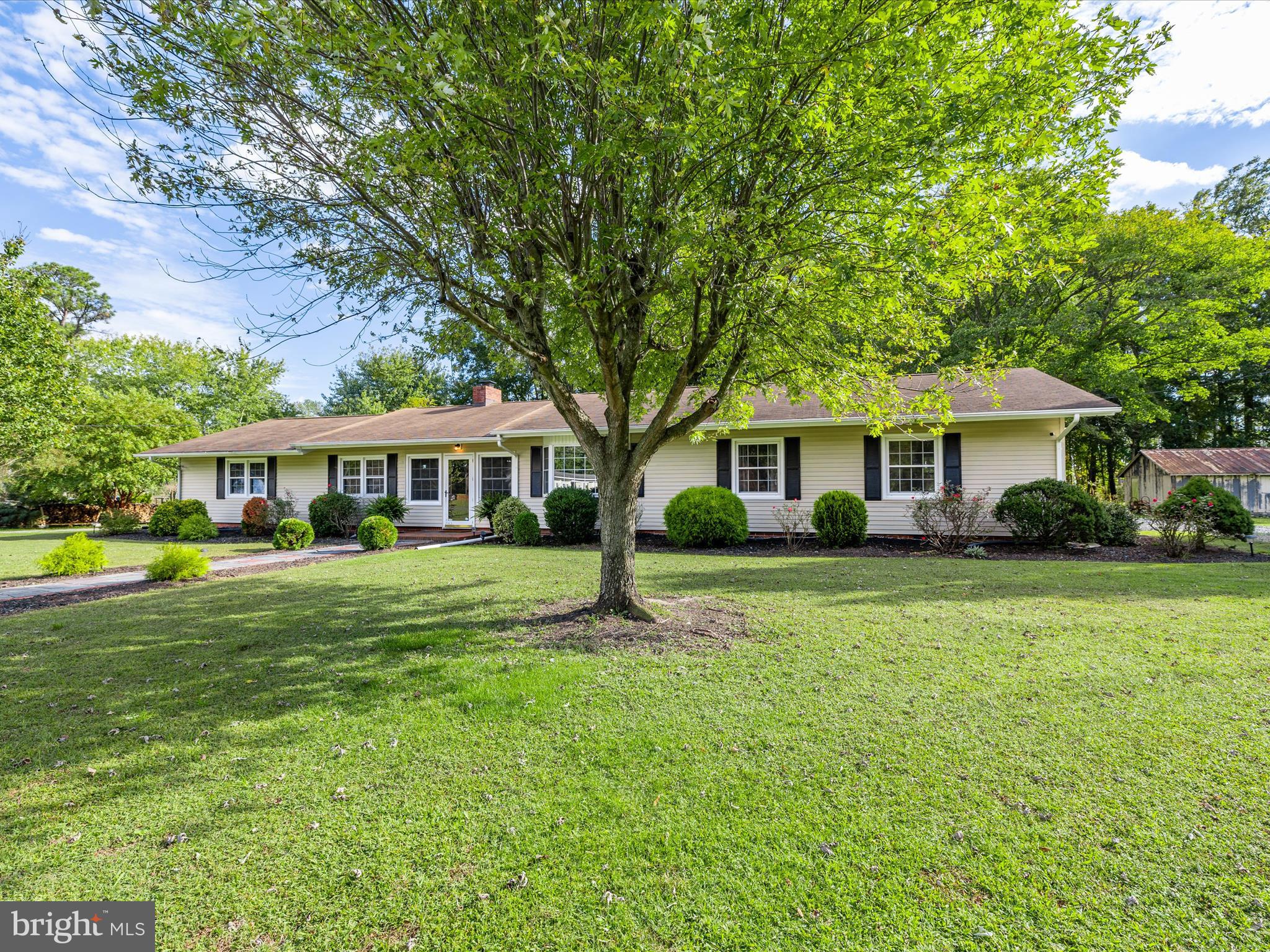 26905 Mt Vernon Road Princess Anne, MD 21853 - Photo 63 of 74 a front view of a house with a garden