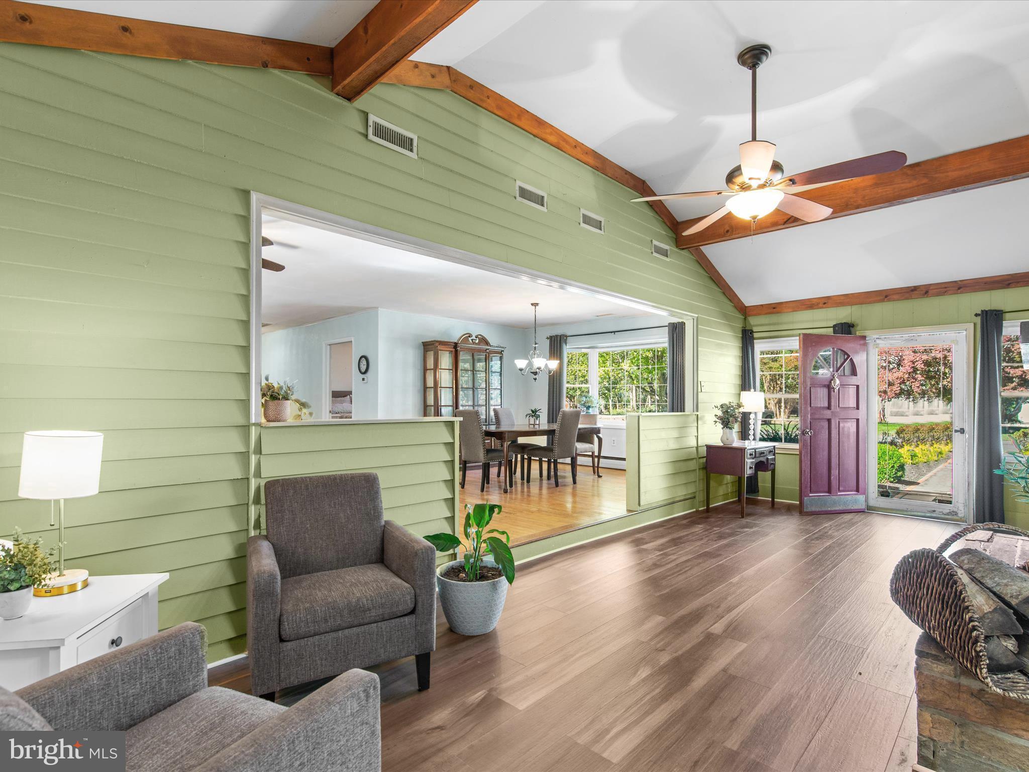 26905 Mt Vernon Road Princess Anne, MD 21853 - Photo 8 of 74 a living room with furniture a ceiling fan and a window