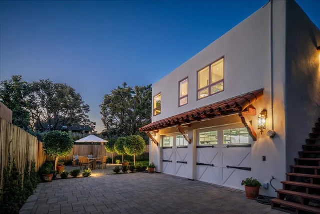 a view of a house with a street