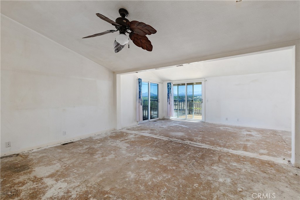 34881 Los Nogales Road Temecula, CA 92592 - Photo 29 of 50 View of Primary bedroom with the retreat and 2 sets of sliding doors to the deck with panoramic views.