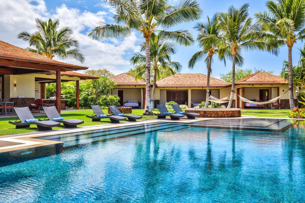 62-3908 Kaunaoa Iki Road Kamuela, HI 96743 - Photo 1 of 21 a swimming pool with outdoor seating and yard