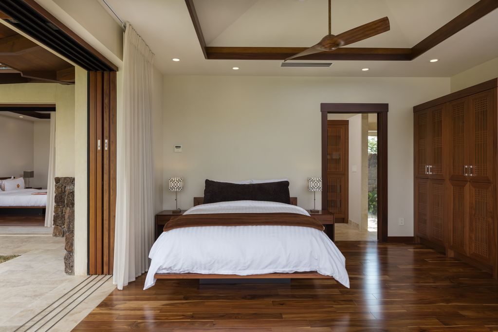62-3908 Kaunaoa Iki Road Kamuela, HI 96743 - Photo 18 of 21 a bedroom with a bed and a view of bedroom