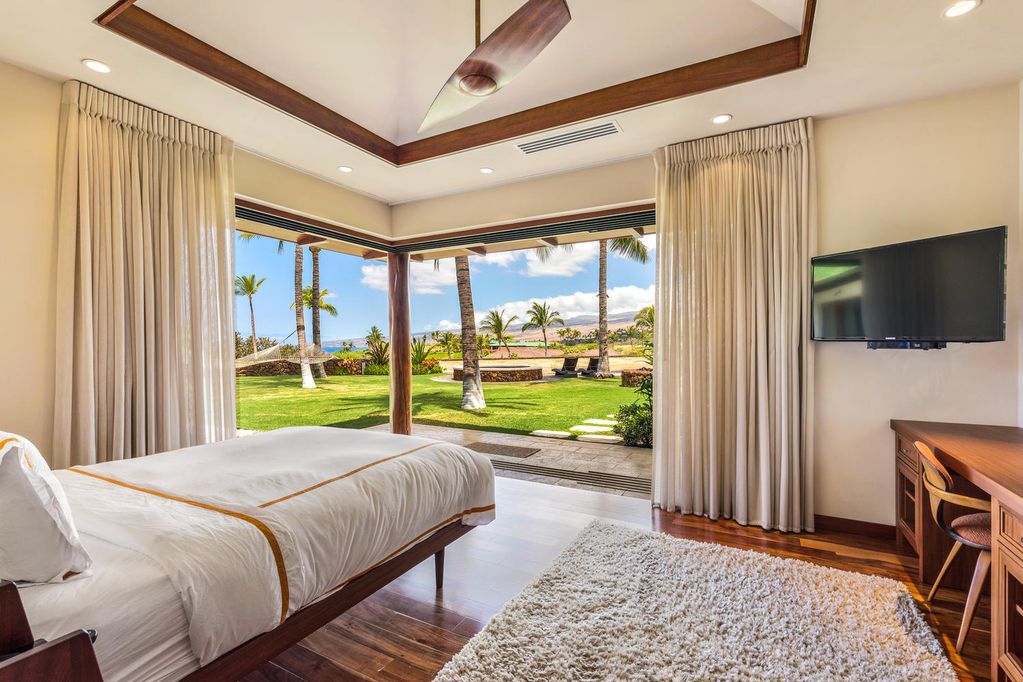 62-3908 Kaunaoa Iki Road Kamuela, HI 96743 - Photo 19 of 21 a bedroom with a bed and a television
