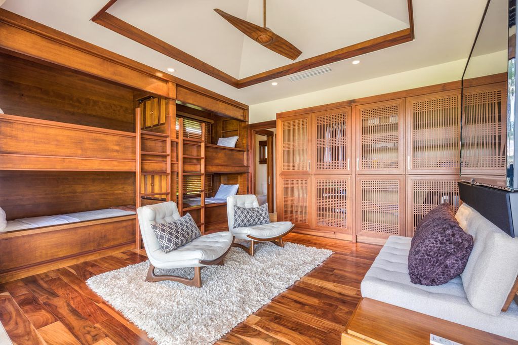 62-3908 Kaunaoa Iki Road Kamuela, HI 96743 - Photo 21 of 21 a living room with furniture and a floor to ceiling window