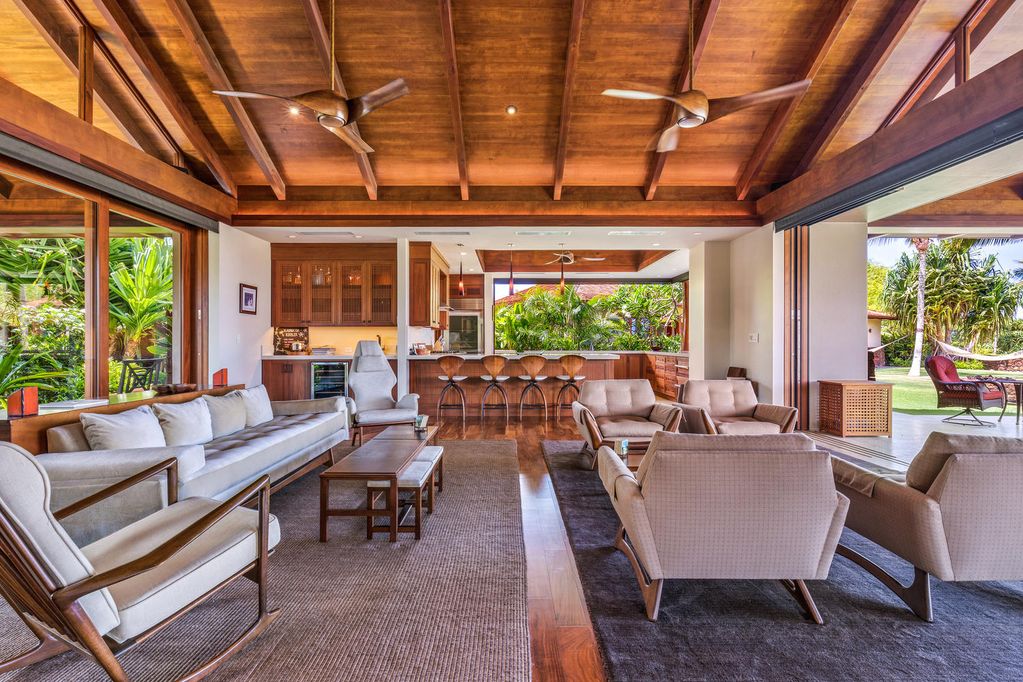 62-3908 Kaunaoa Iki Road Kamuela, HI 96743 - Photo 10 of 21 a living room with lots of furniture wooden floor and a large window