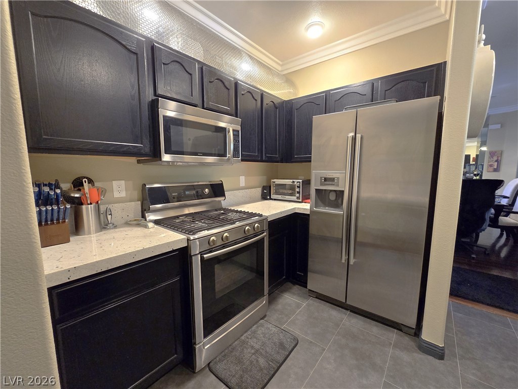 2050 West Warm Springs Road, Unit 2422 Henderson, NV 89014 - Photo 16 of 44 This modern kitchen features sleek appliances and ample counter space for all your culinary needs.