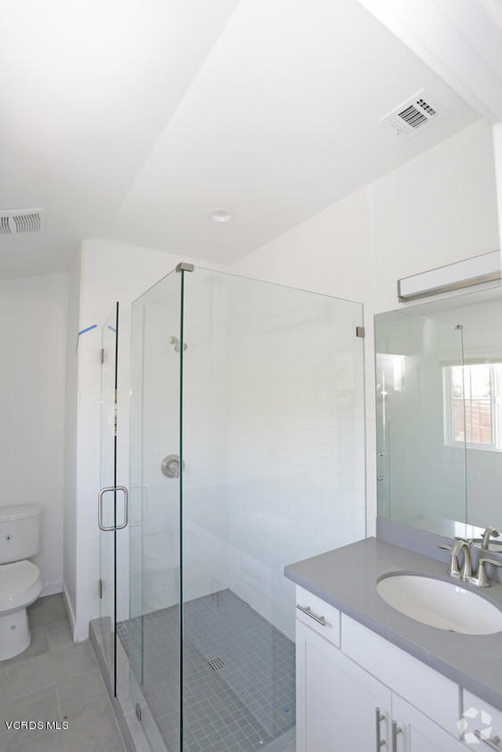 5250 Chesebro Road, Unit 13 Agoura Hills, CA 91301 - Photo 18 of 29 a bathroom with a shower sink and toilet