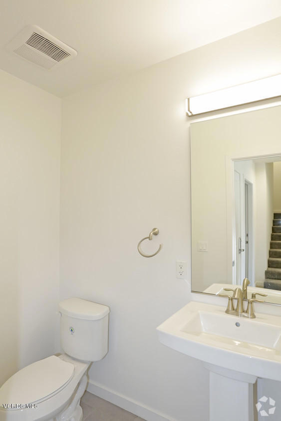 5250 Chesebro Road, Unit 13 Agoura Hills, CA 91301 - Photo 19 of 29 a bathroom with a sink a toilet and shower