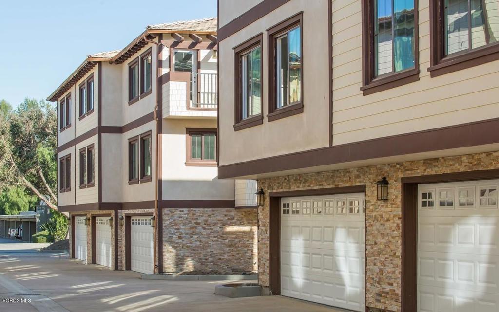 5250 Chesebro Road, Unit 13 Agoura Hills, CA 91301 - Photo 23 of 29 a front view of a building with a street