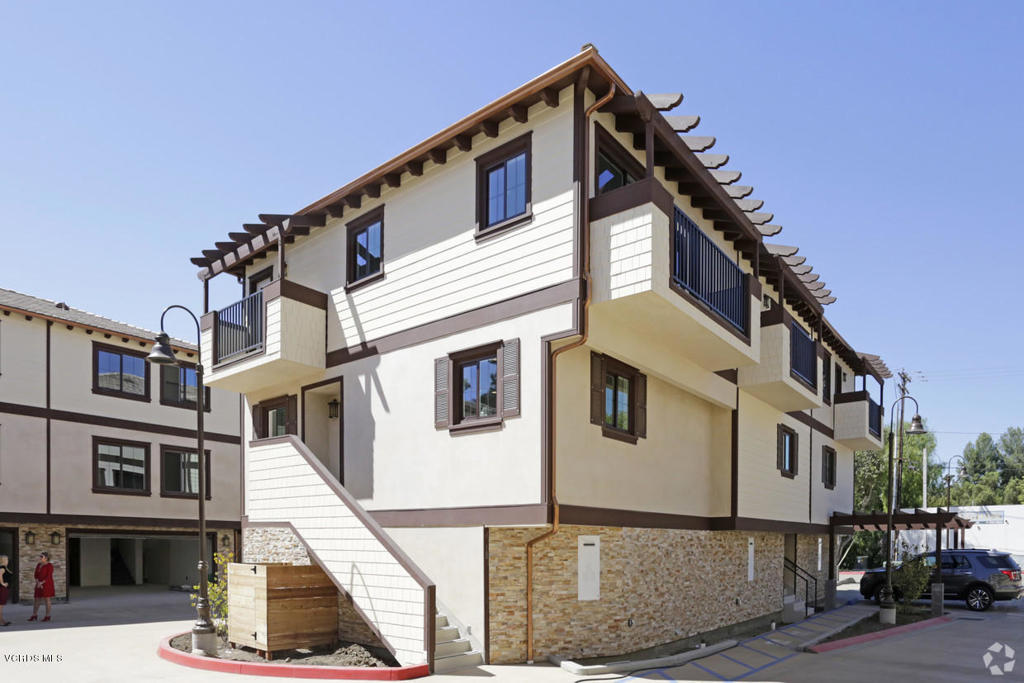 5250 Chesebro Road, Unit 13 Agoura Hills, CA 91301 - Photo 27 of 29 a view of a white building among the street