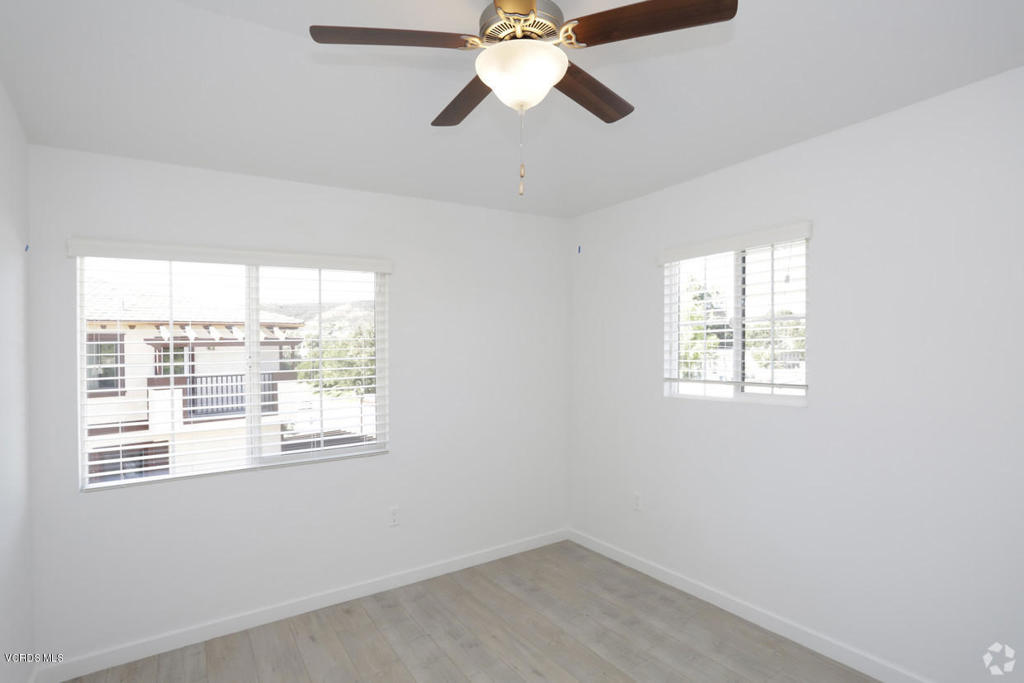 5250 Chesebro Road, Unit 13 Agoura Hills, CA 91301 - Photo 10 of 29 an empty room with a window and a fan