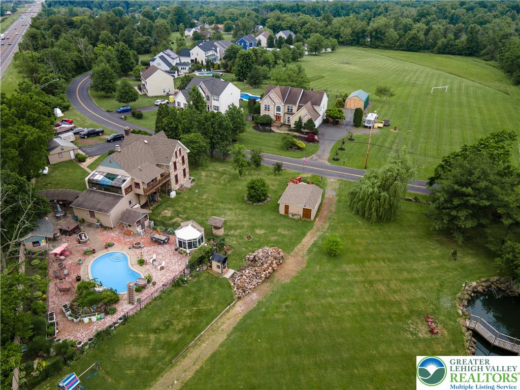 2485 Hieter Road Quakertown, PA 18951 - Photo 85 of 97 An aerial perspective reveals a spacious estate with a private pool and expansive grounds.