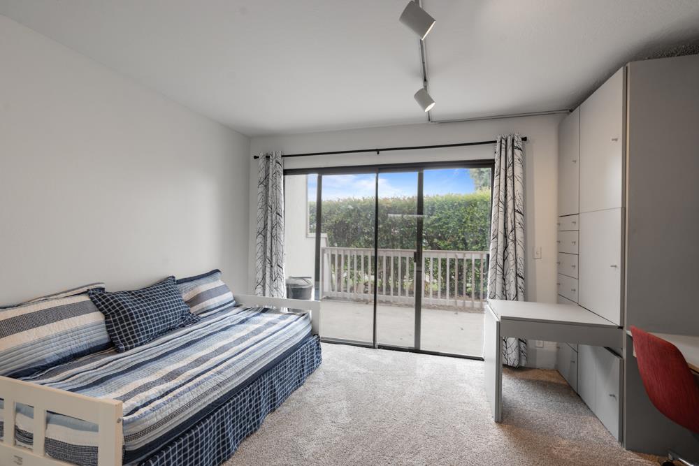 2101 Shore Line Drive, Unit 212 Alameda, CA 94501 - Photo 13 of 28 a bedroom with furniture and a large window