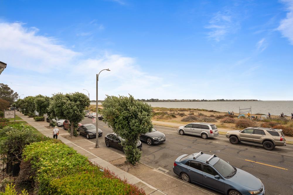 2101 Shore Line Drive, Unit 212 Alameda, CA 94501 - Photo 23 of 28 a view of a city street with cars parked
