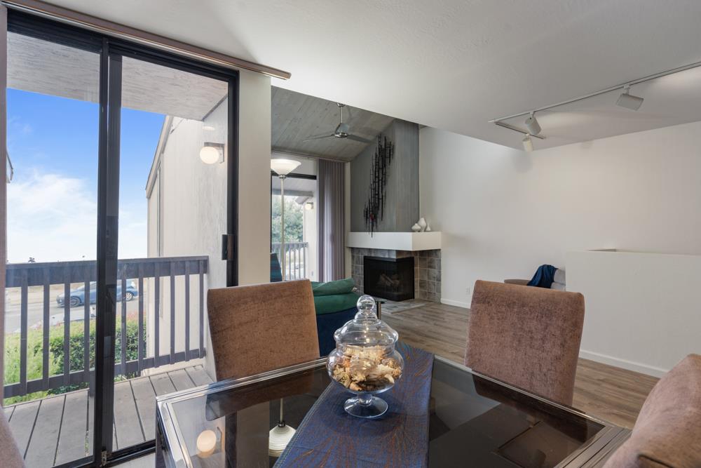 2101 Shore Line Drive, Unit 212 Alameda, CA 94501 - Photo 4 of 28 a living room with furniture and a fireplace