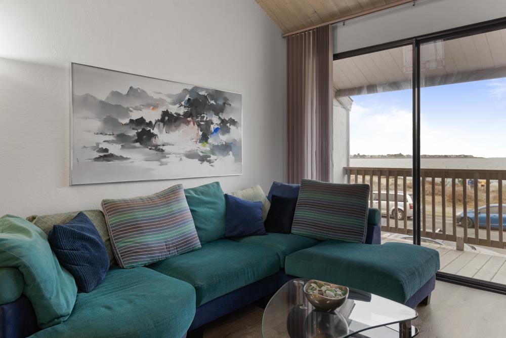 2101 Shore Line Drive, Unit 212 Alameda, CA 94501 - Photo 8 of 28 a living room with furniture and a large window