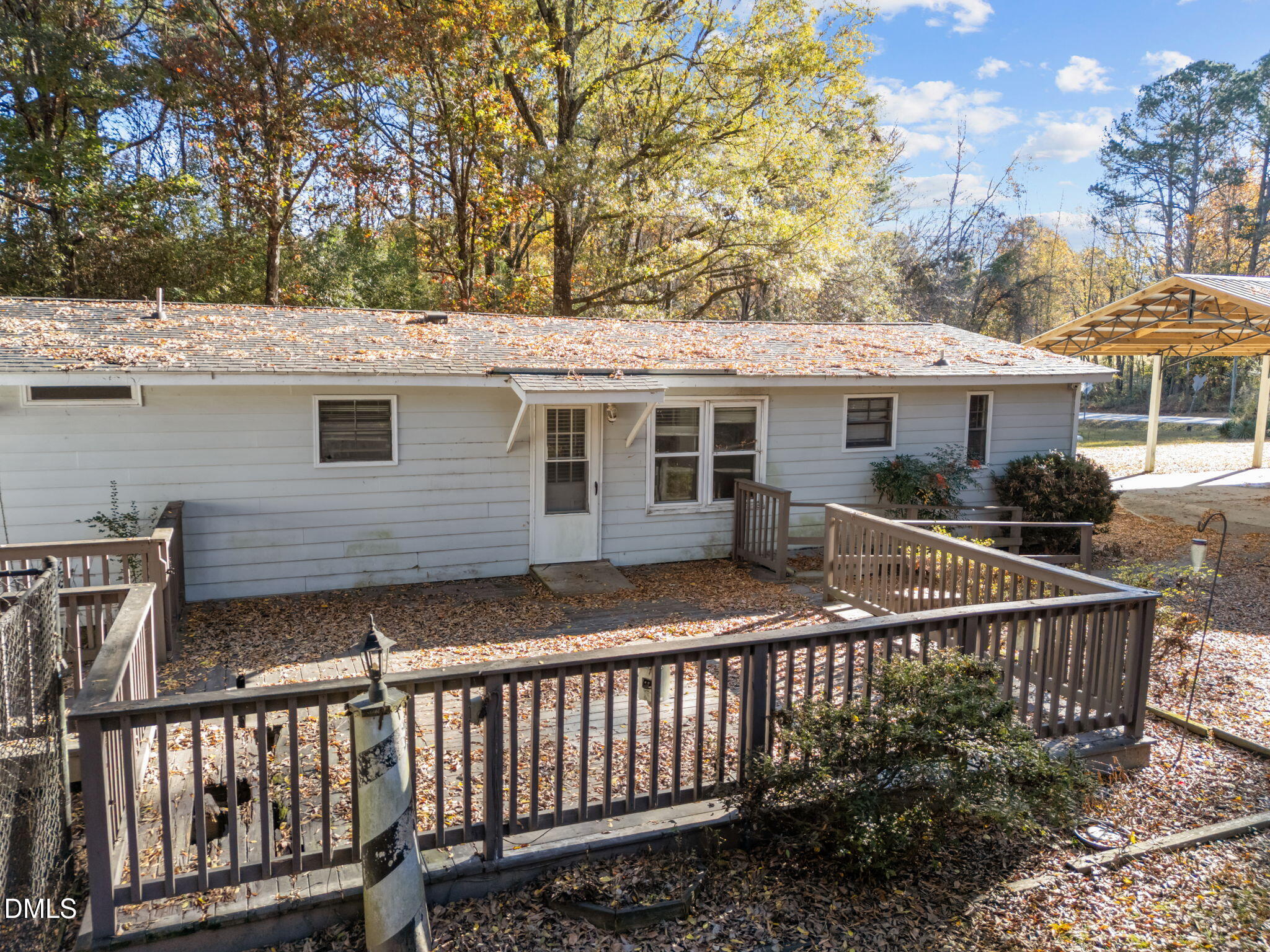 4029 Strickland Farm Road Raleigh, NC 27604 - Photo 10 of 40 a view of a house with a deck