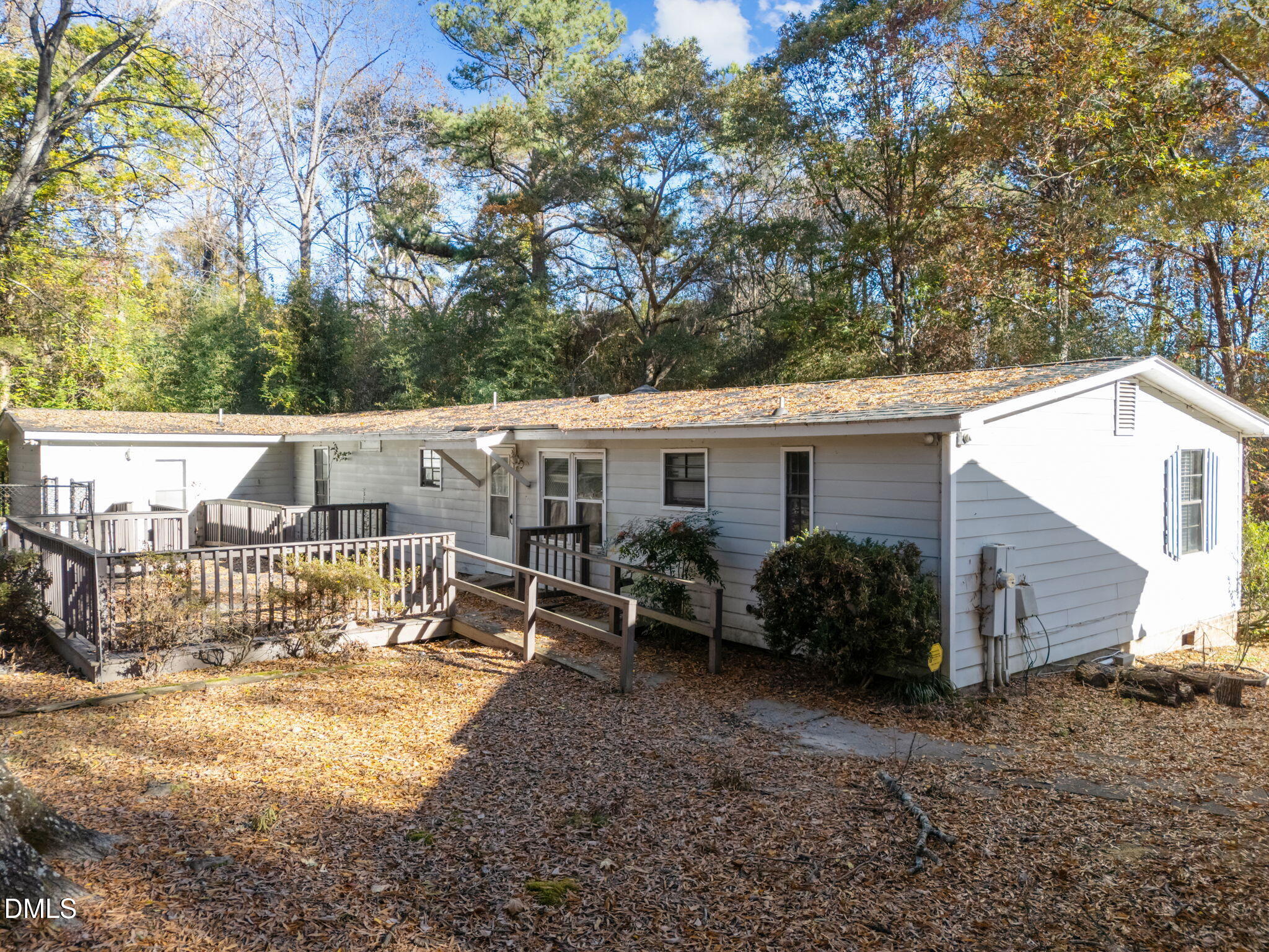 4029 Strickland Farm Road Raleigh, NC 27604 - Photo 11 of 40 a view of a house with backyard and sitting area