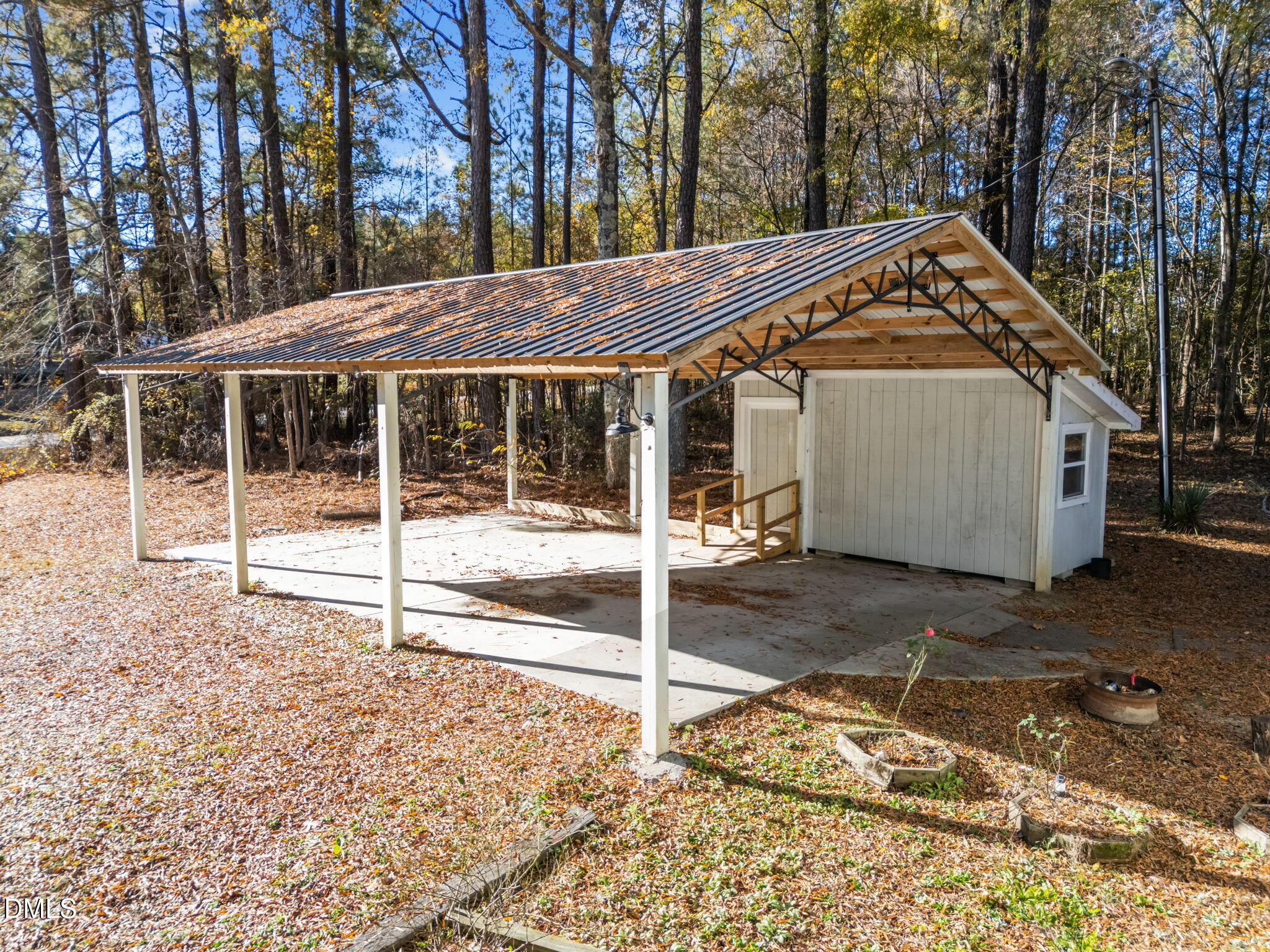 4029 Strickland Farm Road Raleigh, NC 27604 - Photo 15 of 40 a view of a house with a yard and wooden fence