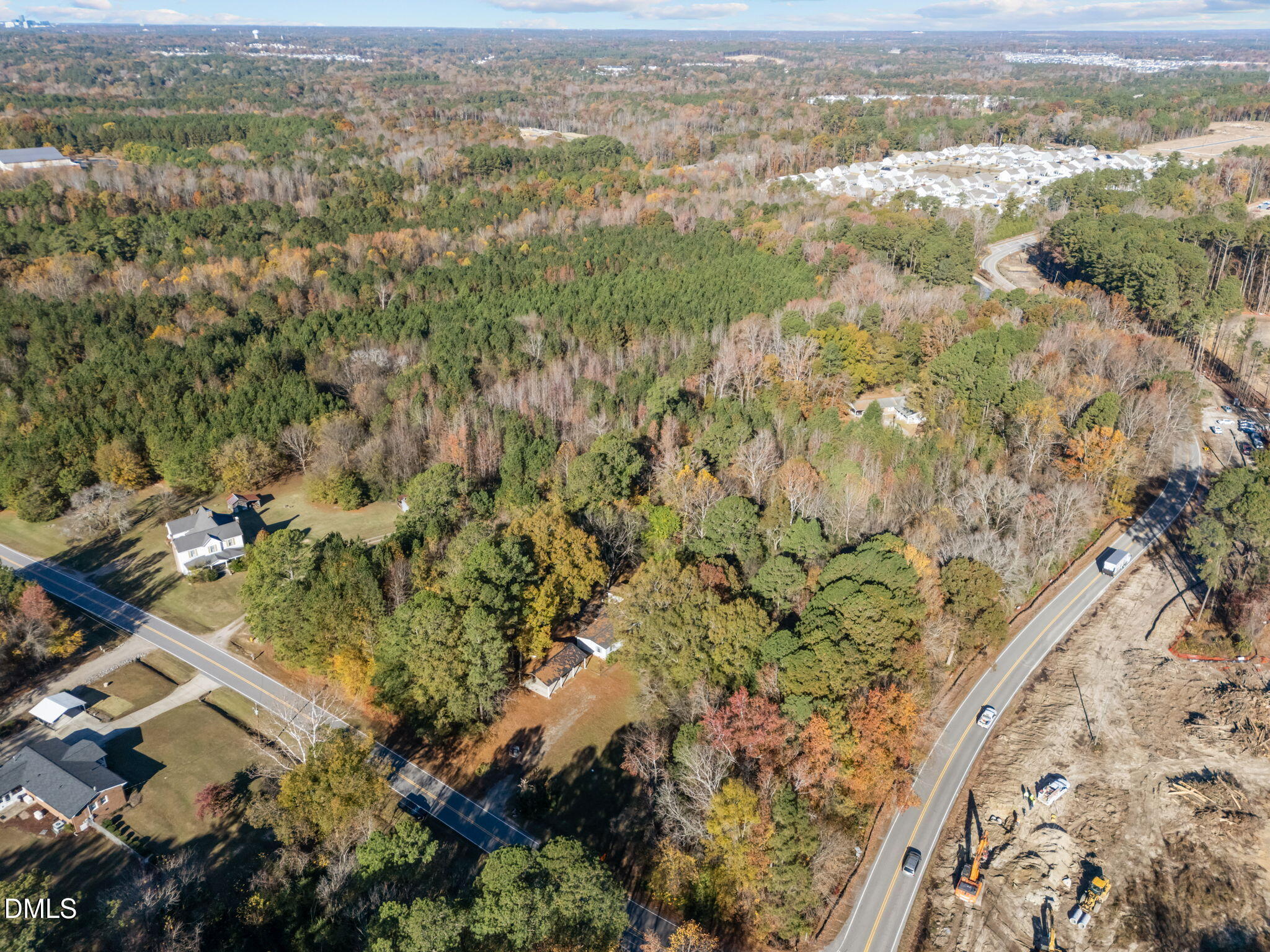 4029 Strickland Farm Road Raleigh, NC 27604 - Photo 18 of 40 an aerial view of residential houses with outdoor space and trees