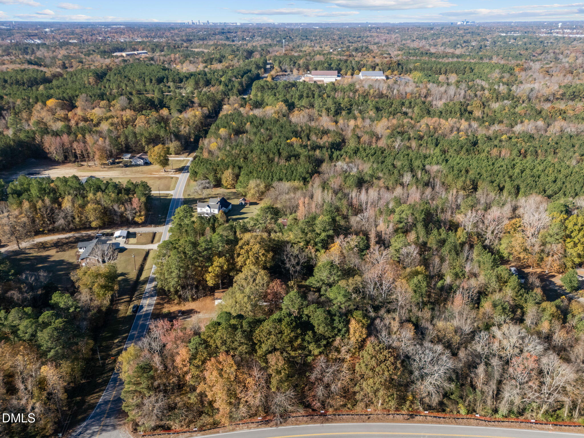 4029 Strickland Farm Road Raleigh, NC 27604 - Photo 19 of 40 an aerial view of residential houses with outdoor space and trees