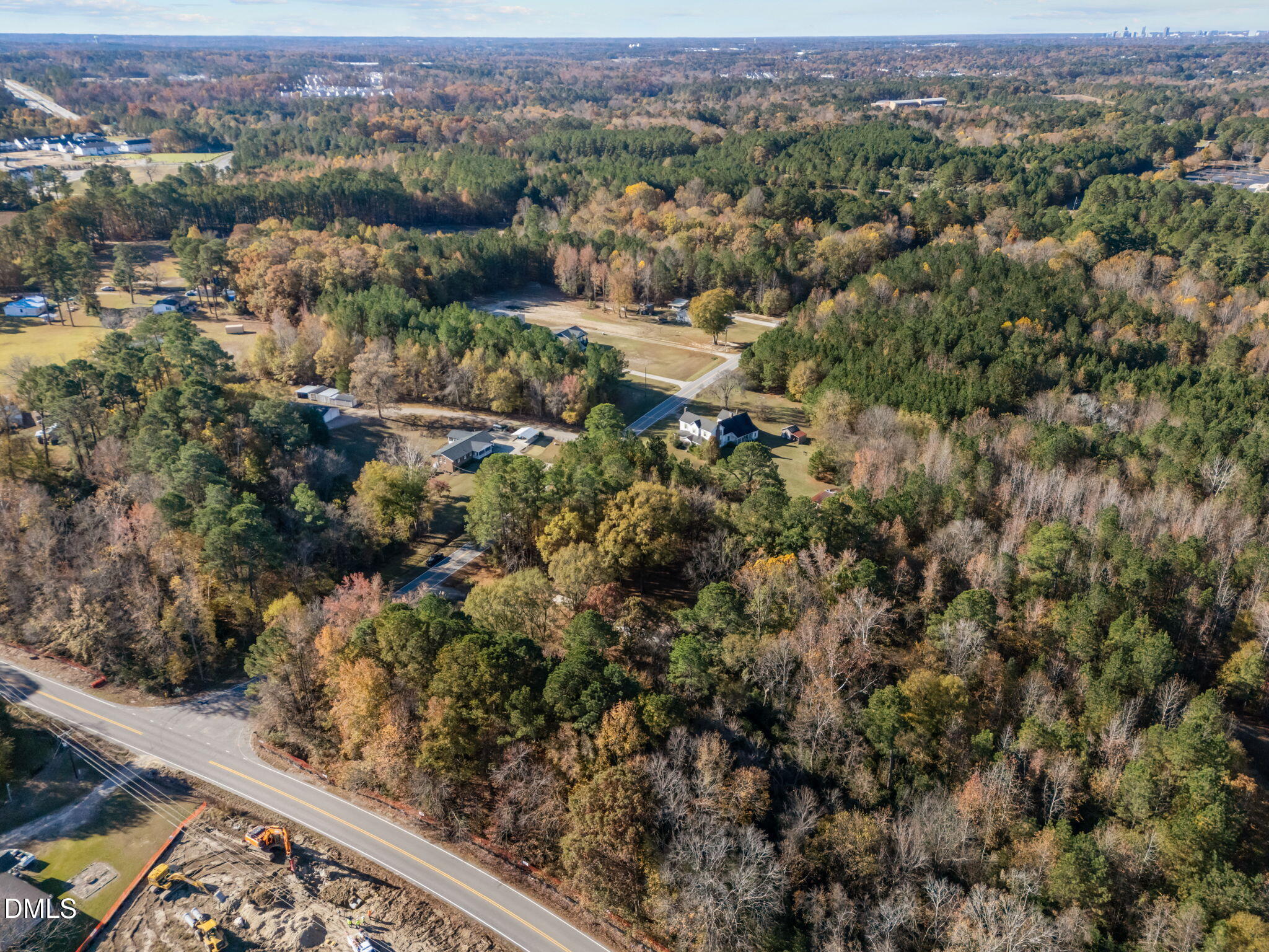 4029 Strickland Farm Road Raleigh, NC 27604 - Photo 20 of 40 an aerial view of a forest with houses
