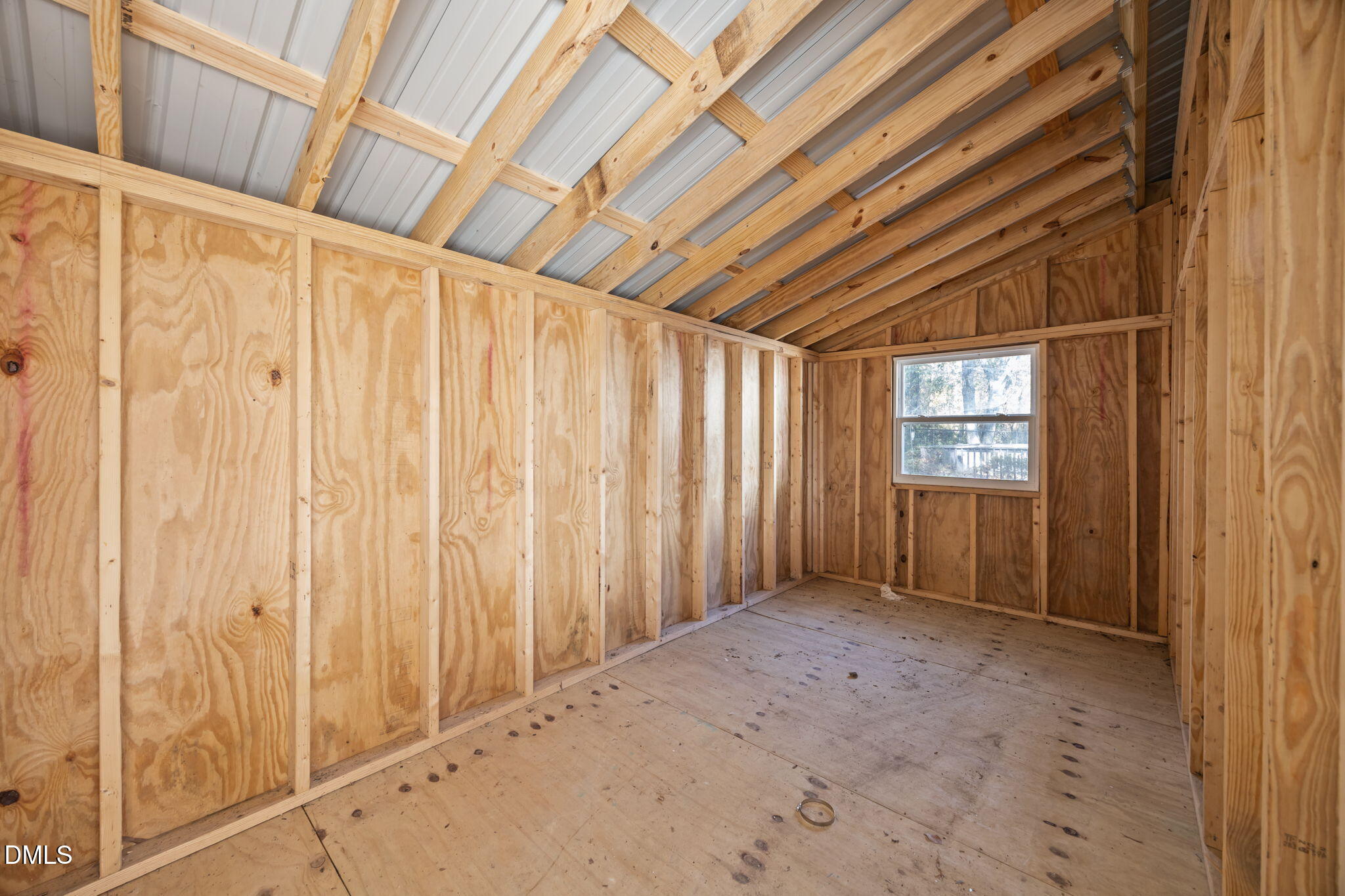 4029 Strickland Farm Road Raleigh, NC 27604 - Photo 22 of 40 a view of an empty room with a window