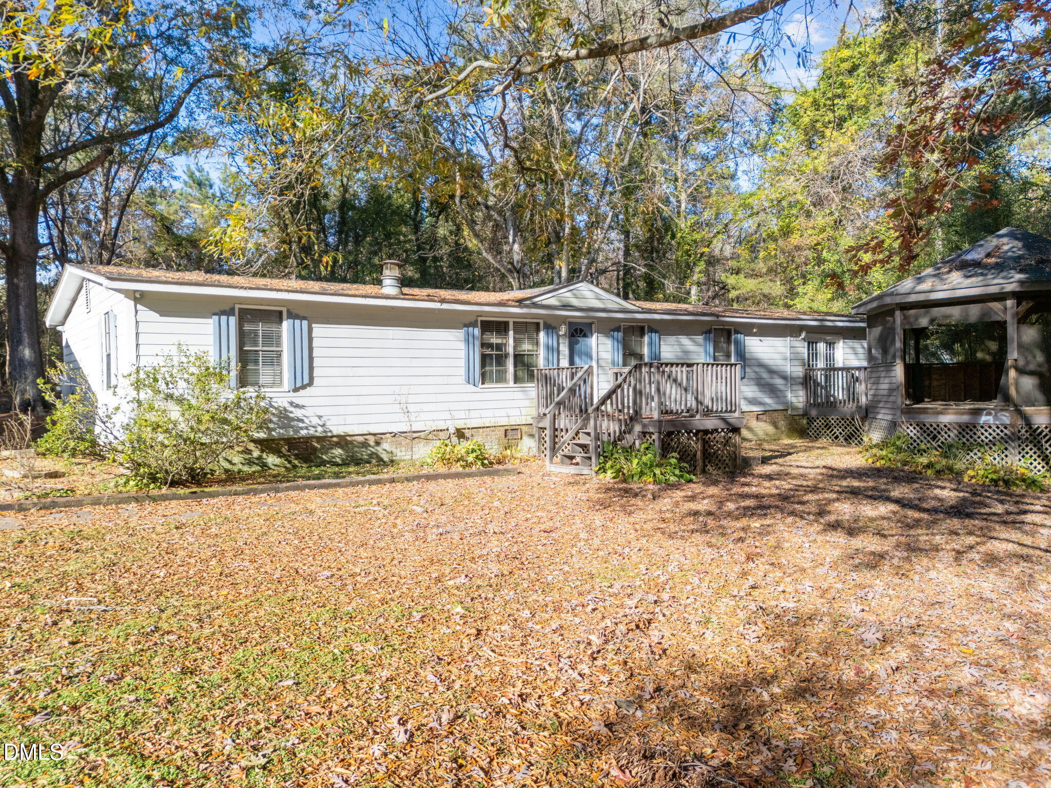 4029 Strickland Farm Road Raleigh, NC 27604 - Photo 2 of 40 front view of a house with a yard