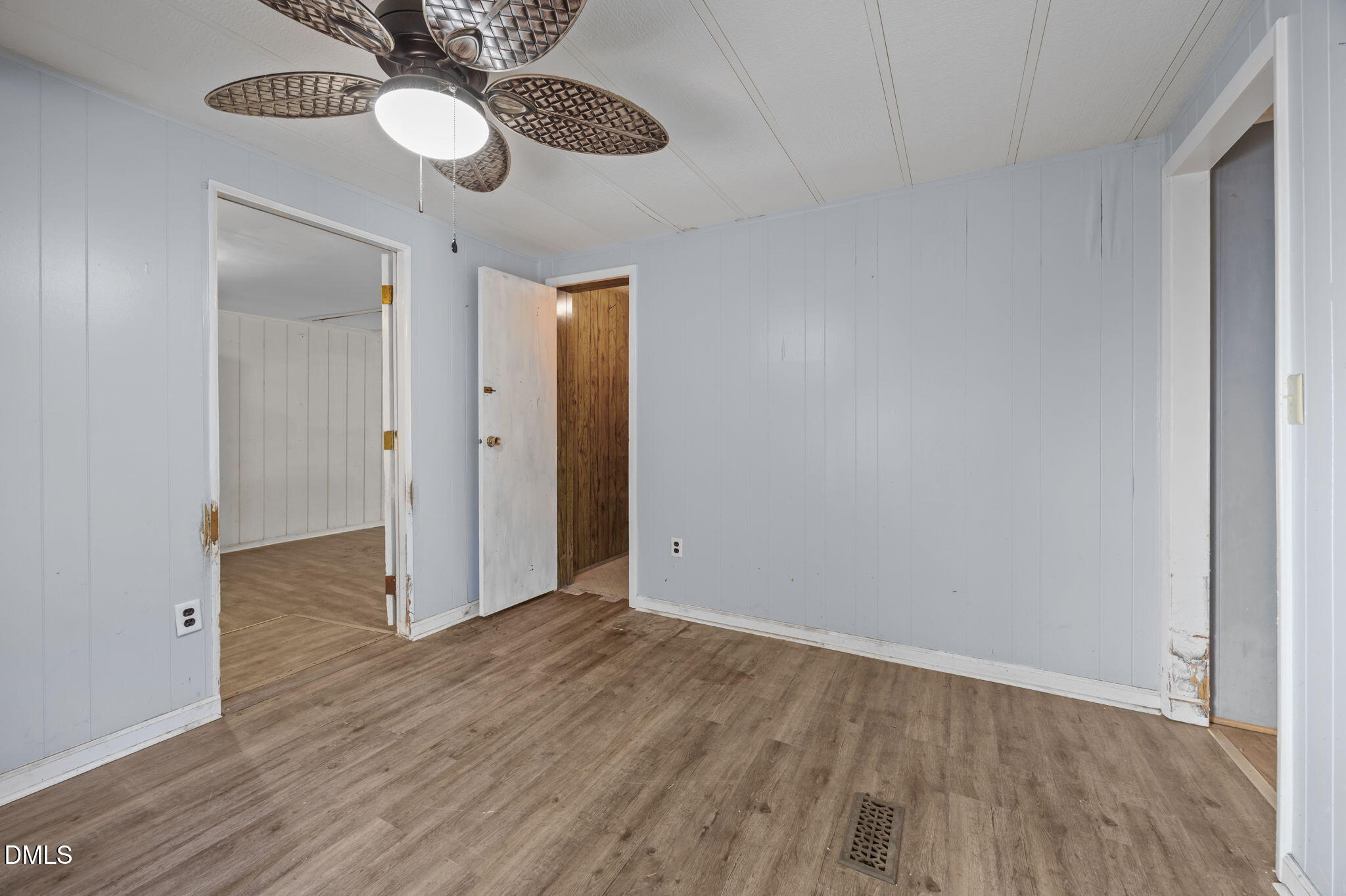 4029 Strickland Farm Road Raleigh, NC 27604 - Photo 31 of 40 a view of an empty room and wooden floor