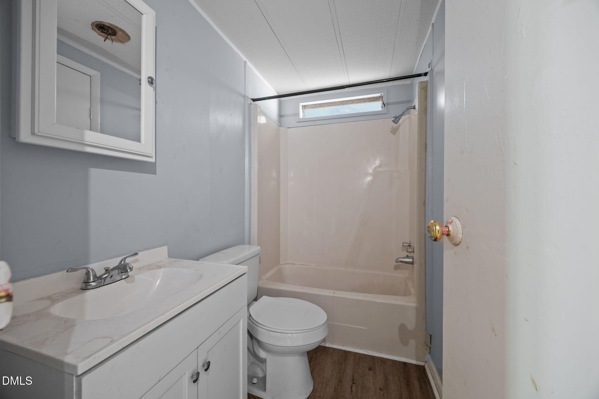 4029 Strickland Farm Road Raleigh, NC 27604 - Photo 32 of 40 a bathroom with a sink toilet and shower