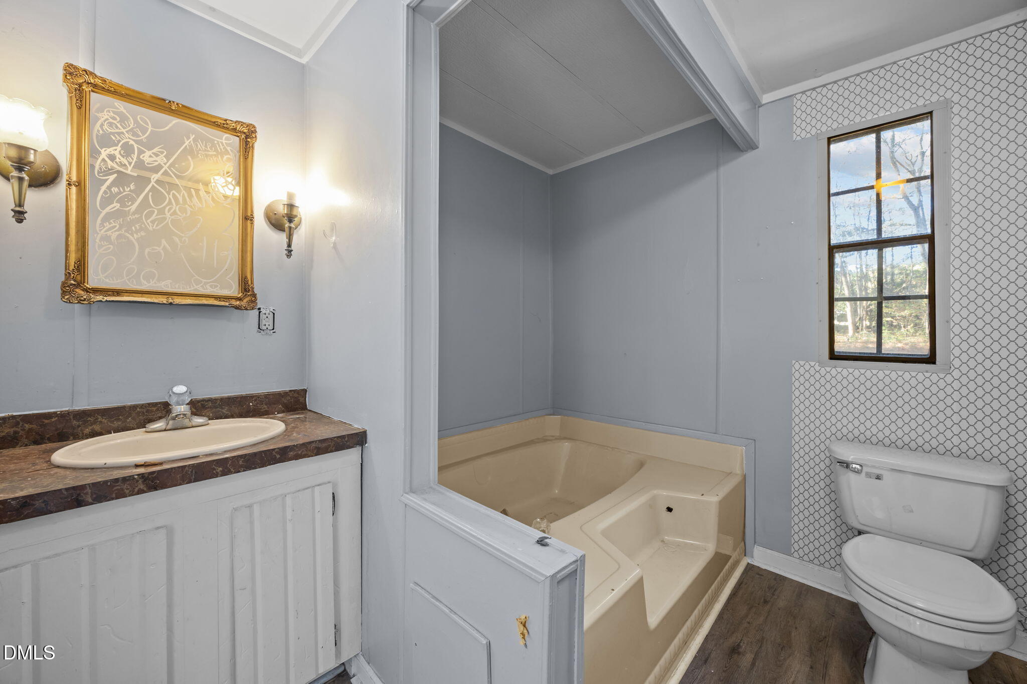 4029 Strickland Farm Road Raleigh, NC 27604 - Photo 36 of 40 a bathroom with a sink and a toilet