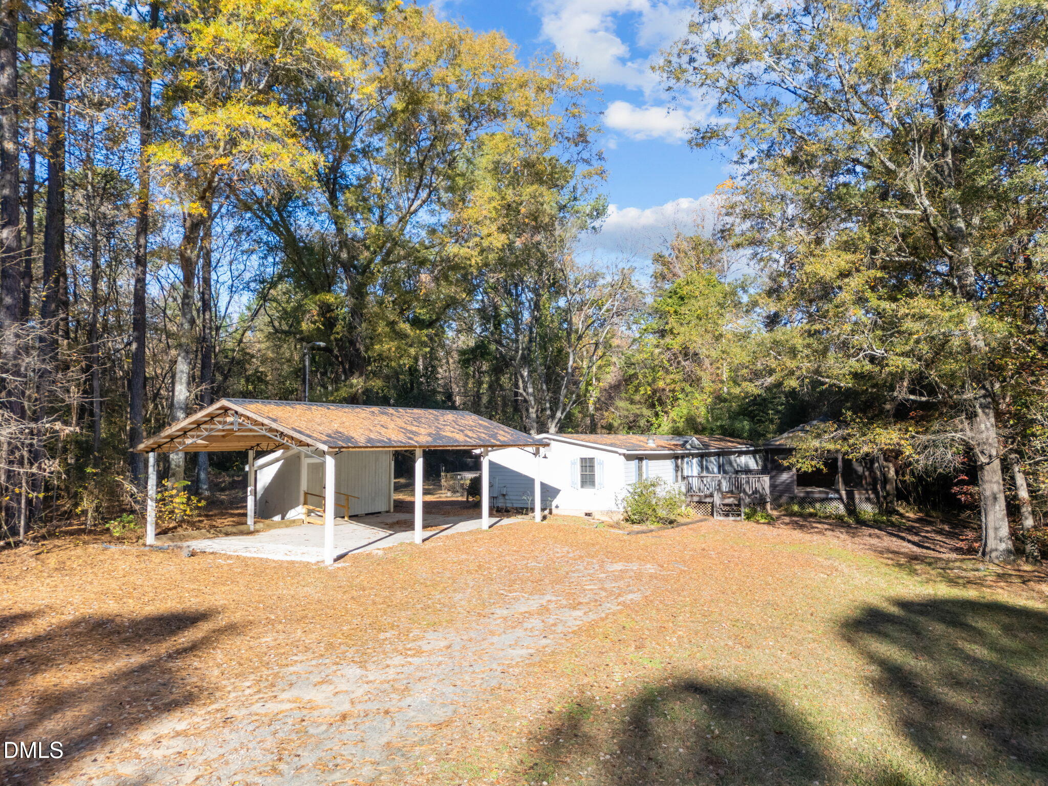4029 Strickland Farm Road Raleigh, NC 27604 - Photo 3 of 40 a house with trees in front of it