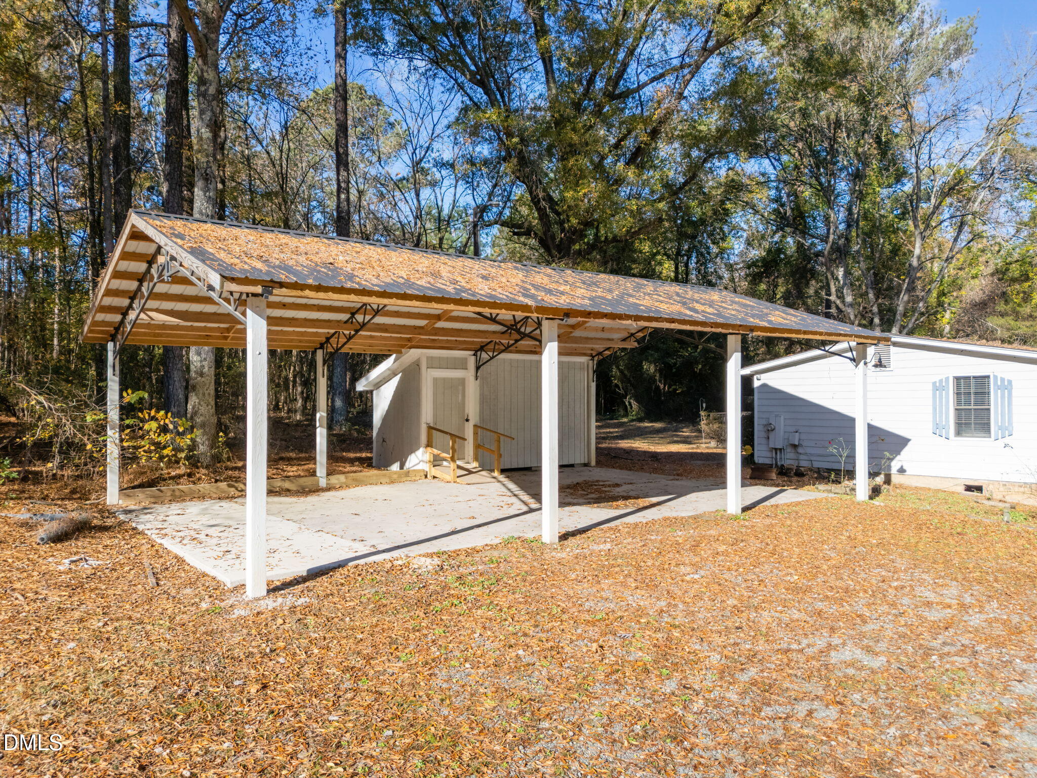 4029 Strickland Farm Road Raleigh, NC 27604 - Photo 4 of 40 a view of house with a outdoor space next to a road