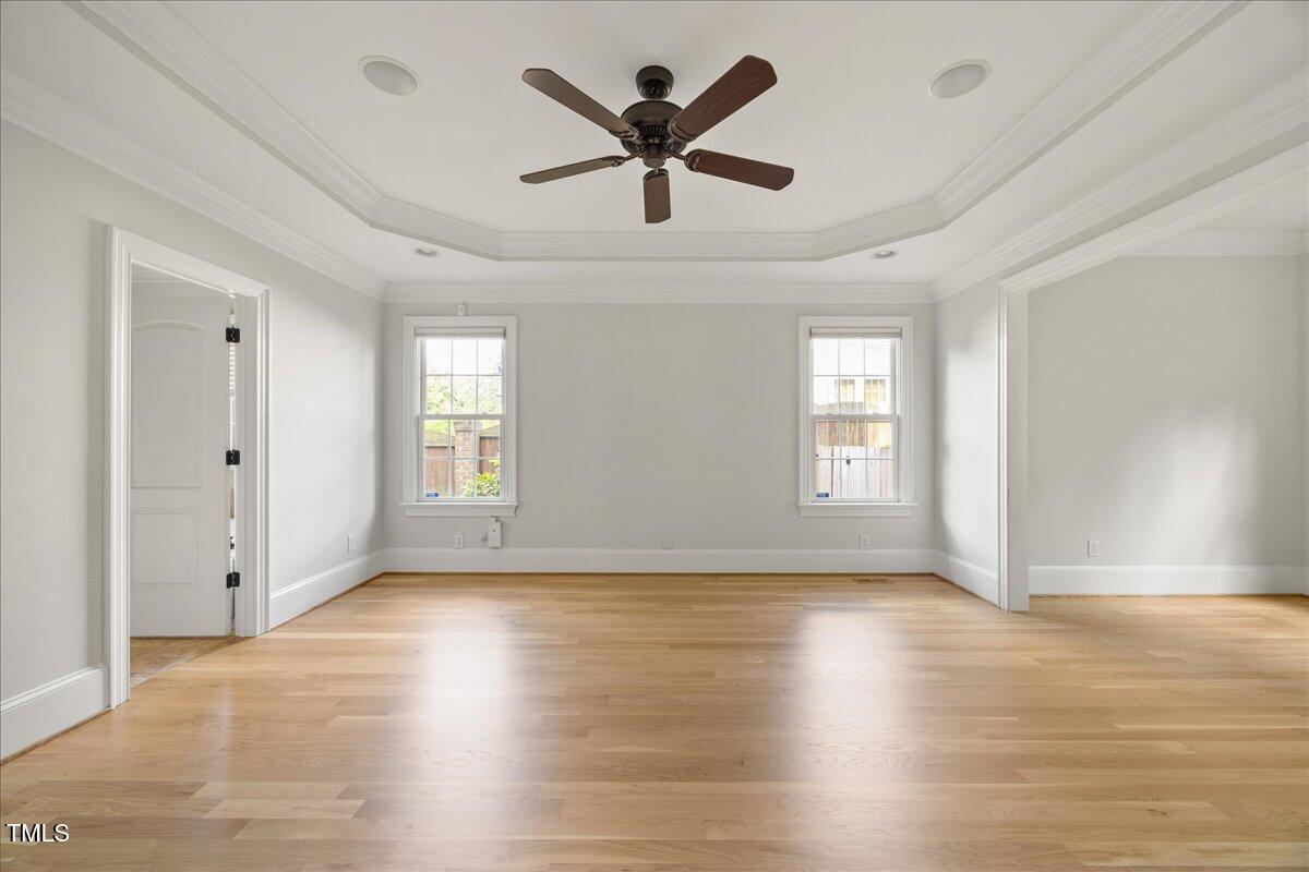 2507 Mayview Road Raleigh, NC 27607 - Photo 23 of 53 1st floor primary suite with hardwoods, tray ceilings, and separate sitting are