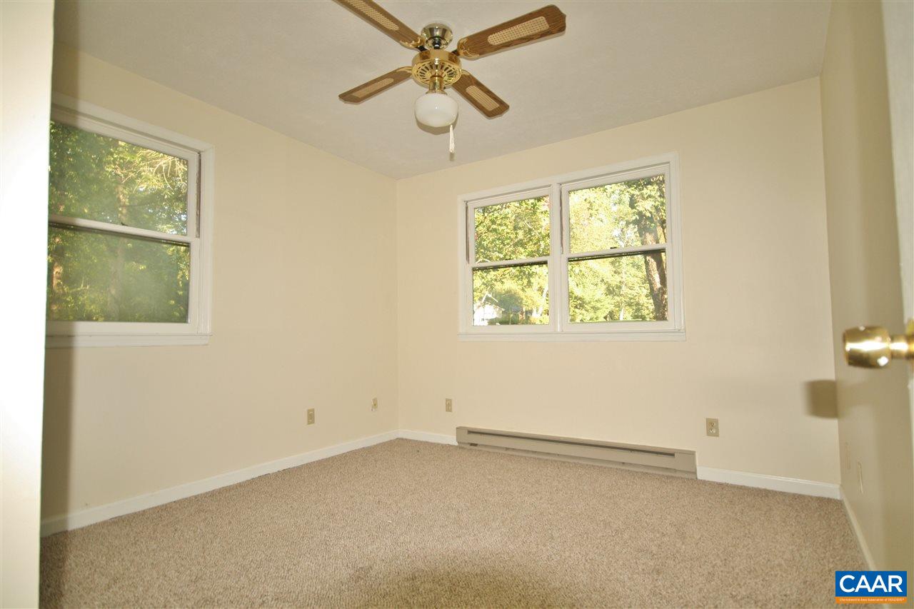 65 Gladiola Road Ruckersville, VA 22968 - Photo 13 of 19 an empty room with a window and a fan