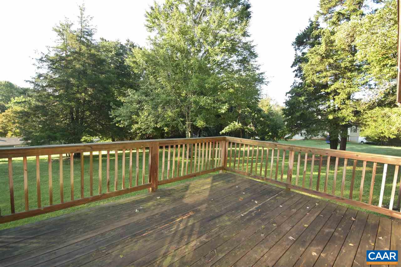 65 Gladiola Road Ruckersville, VA 22968 - Photo 17 of 19 a view of balcony with wooden floor and fence