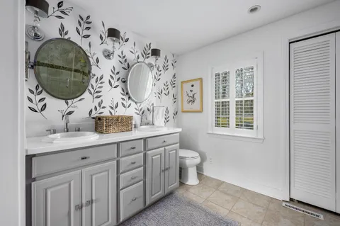 a bathroom with a sink and a toilet