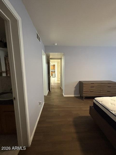 151 East Broadway Road, Unit 103 Tempe, AZ 85282 - Photo 13 of 37 Primary Suite to hallway into living are