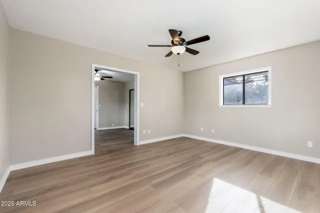 a bathroom with a sink toilet a mirror and shower
