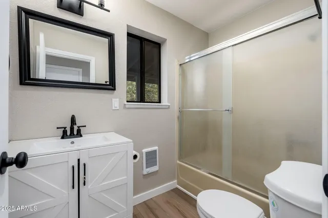 a view of balcony with wooden floor