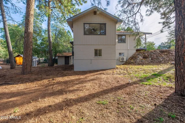 a view of a yard with a tree