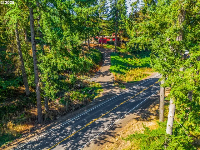 a street sign that is on a wooden floor