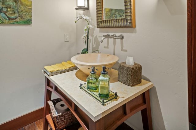 a dining room with table and hallway
