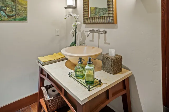 a dining room with table and hallway