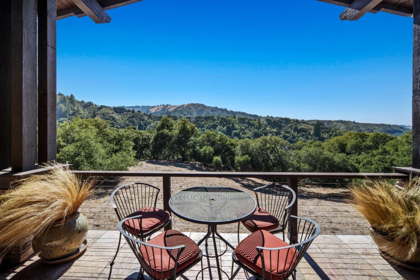 43 Rancho San Carlos Road Carmel, CA 93923 - Photo 30 of 51 a balcony with table and chairs