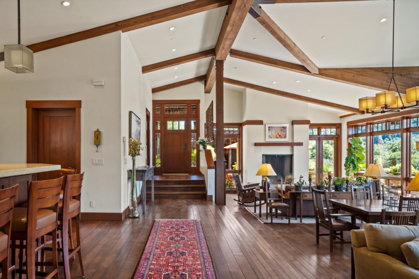 43 Rancho San Carlos Road Carmel, CA 93923 - Photo 6 of 51 a living room with furniture a rug and a large window
