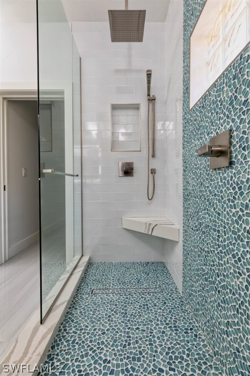 8856 Ventura Way Naples, FL 34109 - Photo 21 of 34 a bathroom with a granite countertop shower