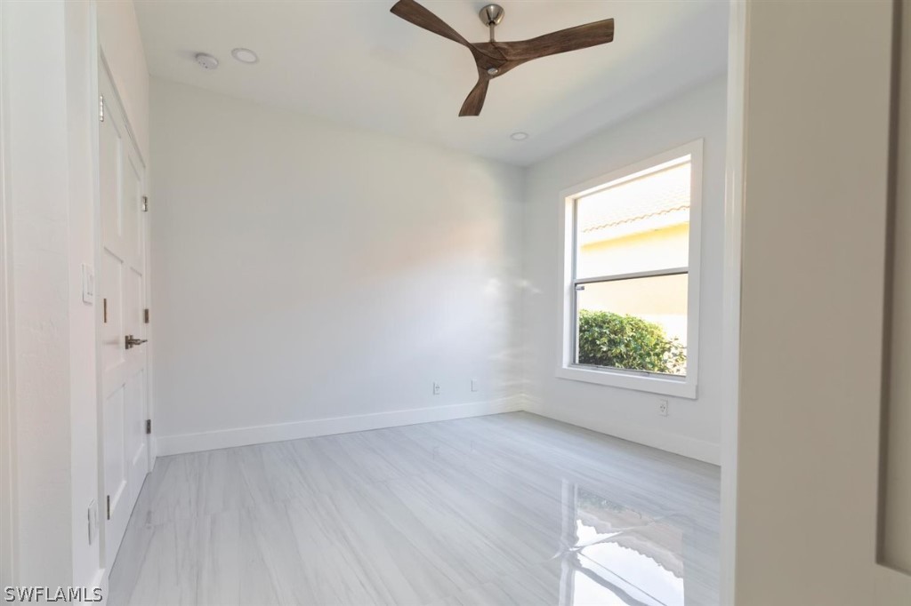 8856 Ventura Way Naples, FL 34109 - Photo 24 of 34 an empty room with a window