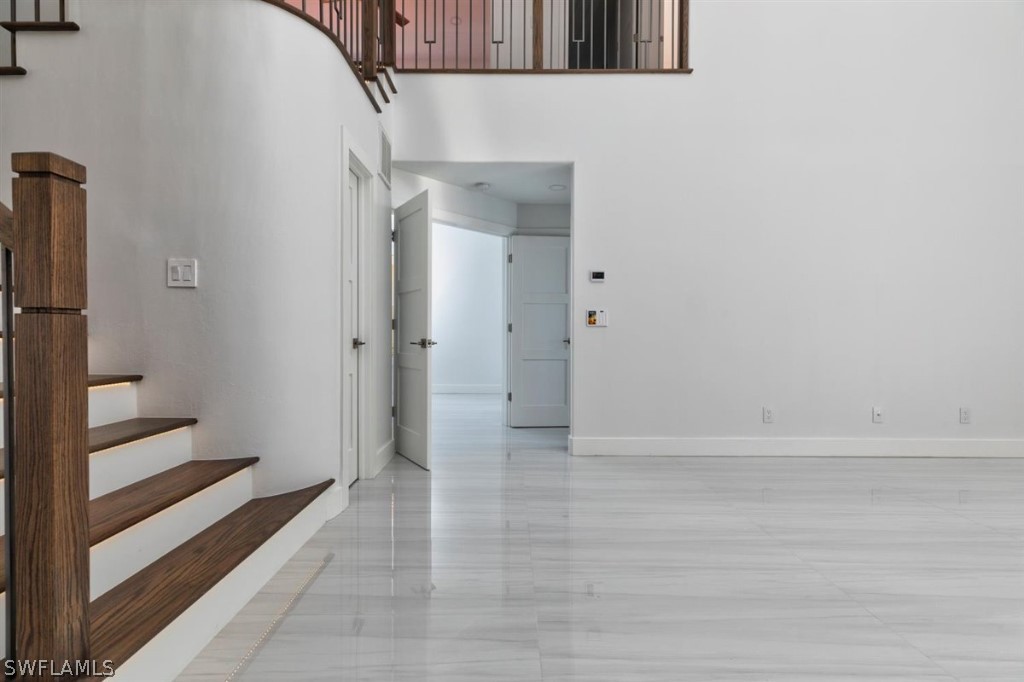 8856 Ventura Way Naples, FL 34109 - Photo 7 of 34 a view of an empty walk in closet
